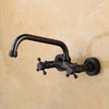 Swivel Spout Brass Wall Mounted Basin Faucet Dual Handle Mixer Tap